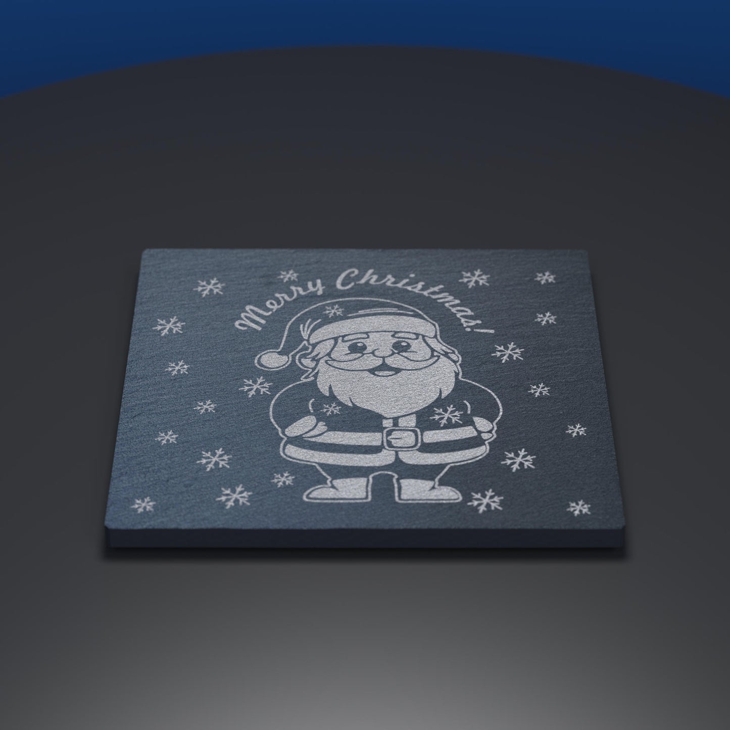 Slate coaster engraved with cartoon santa and Merry Christmas text