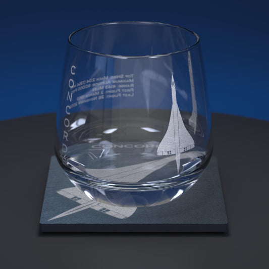 Glass whiskey tumbler engraved with Concorde and factual information about concorde, together with slate coaster which has an engraved image of concorde