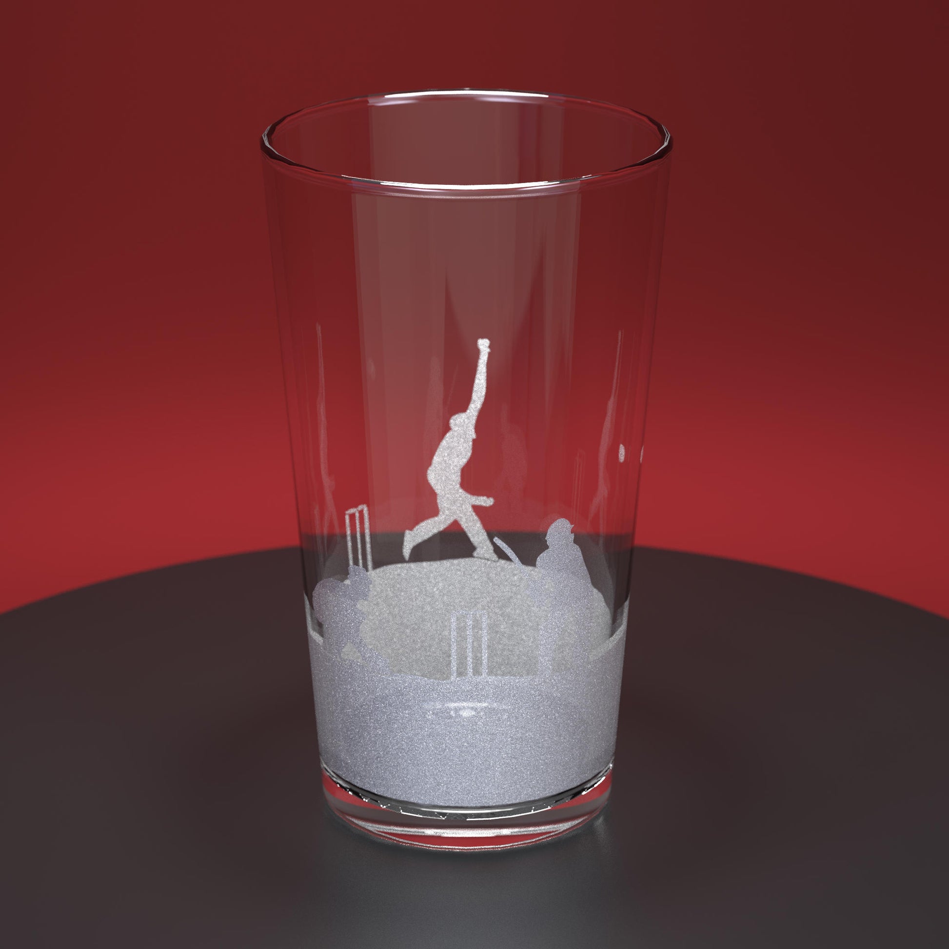 Pint glass engraved with a cricket theme