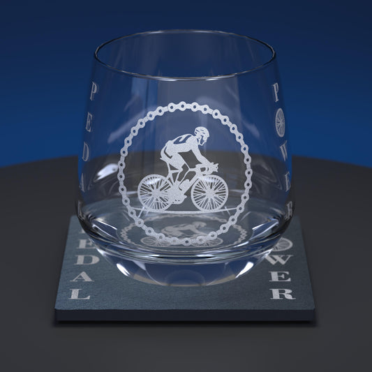 Glass whiskey tumbler set including engraved cyclist  with Pedal Power written either side of him together with matching slate coaster