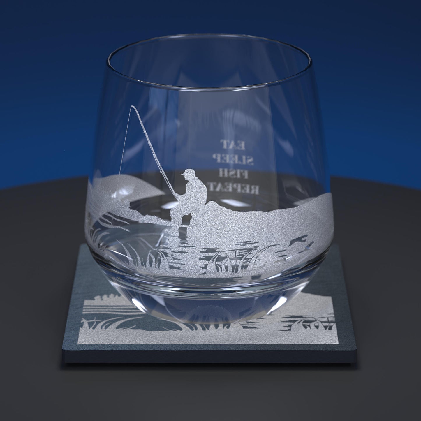 Glass whiskey tumbler engraved with Fishing design and the words Eat, sleep , fish, repeat together with matching slate coaster