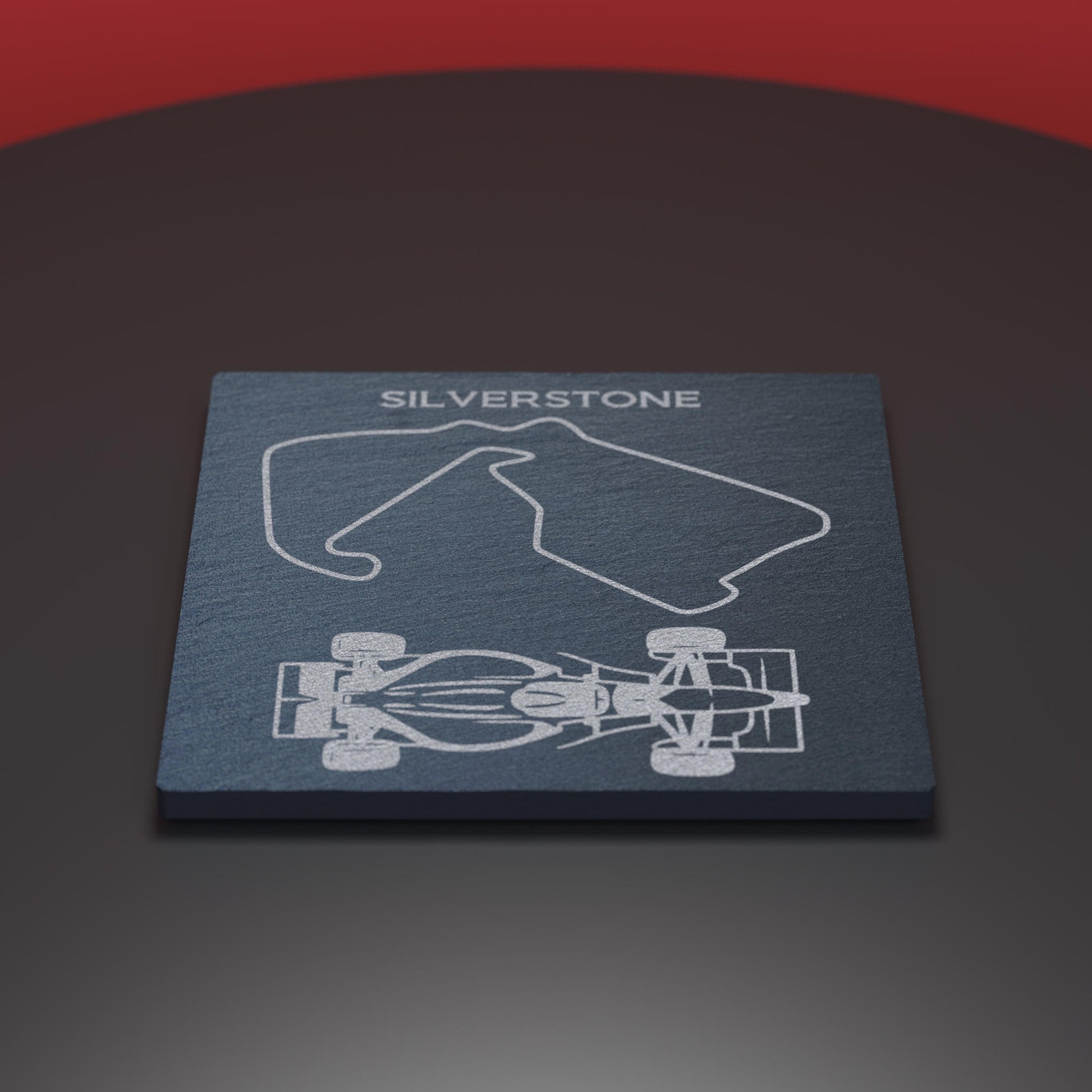 Slate coaster engraved with F1 car and silverstone course