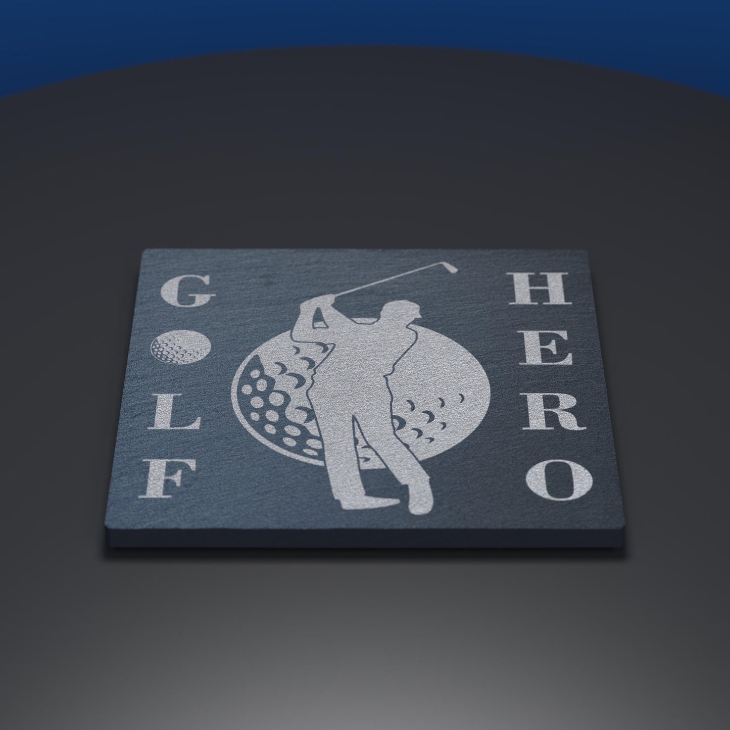 Slate coaster engraved with a golfer and golf ball with the words Golf Hero