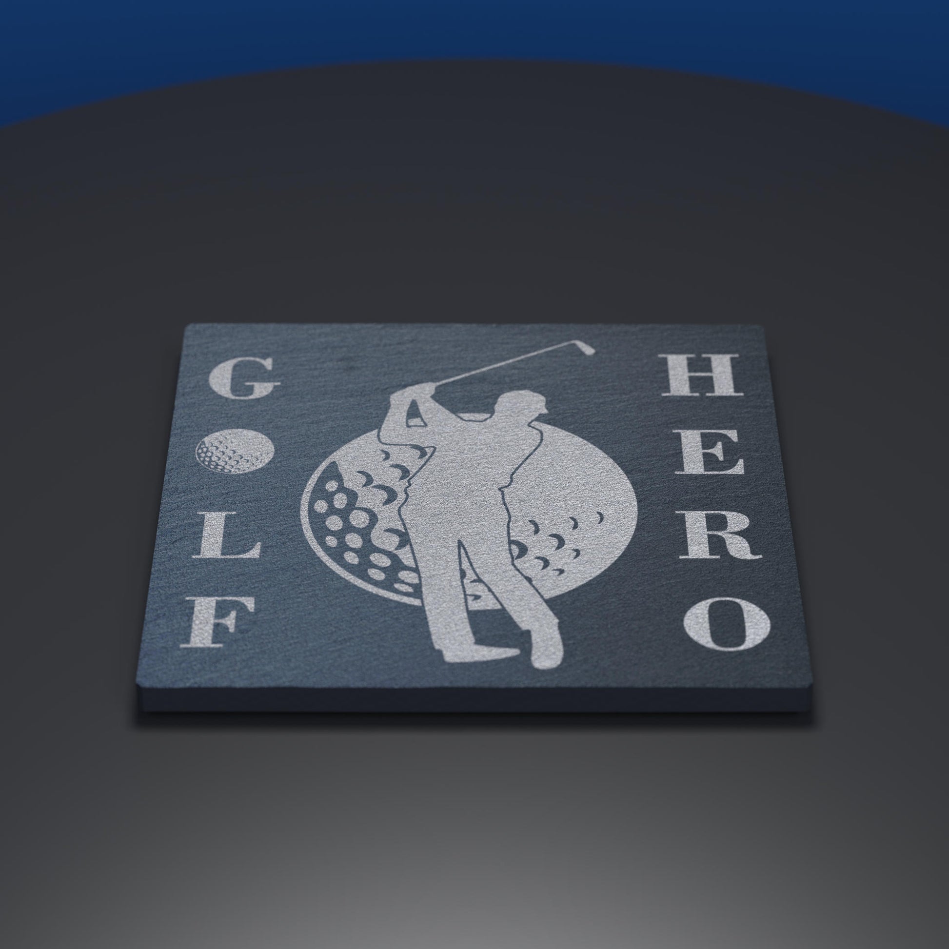 Slate coaster engraved with a golfer and golf ball with the words Golf Hero