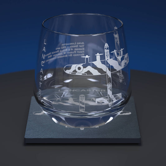 Glass whiskey tumbler engraved with ww2 Lancaster Bomber Aircraft together with engraved slate coaster