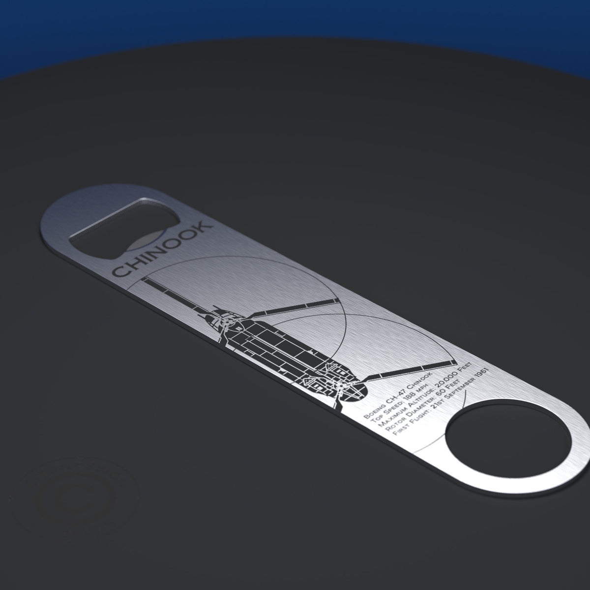 A silver stainless steel bottle opener engraved with the name 'CHINOOK' and a line-art illustration of a Chinook displayed  on it.