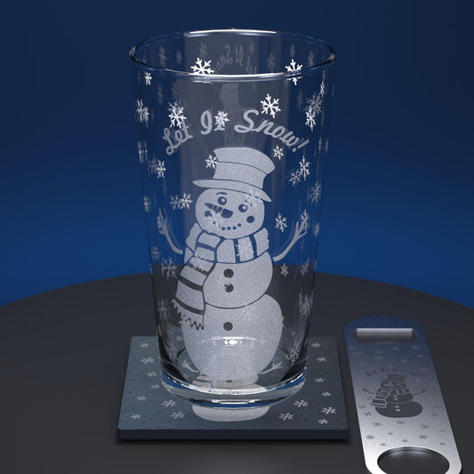 Pint glass set comprising glass, slate coaster and stainless steel bottle opener engraved with a cartoon snowman and Let it Snow text