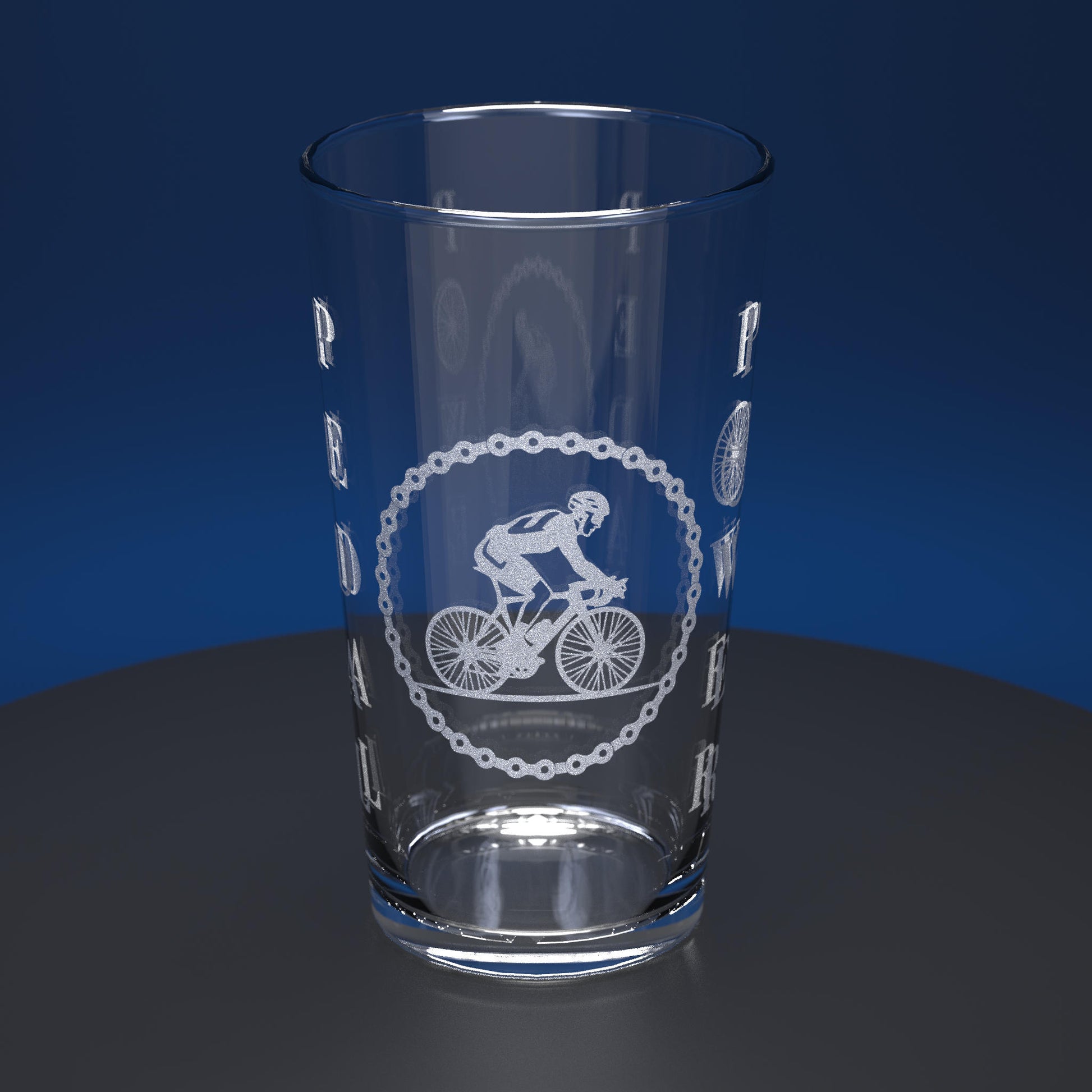 Pint glass engraved with cyclist and Pedal Power text