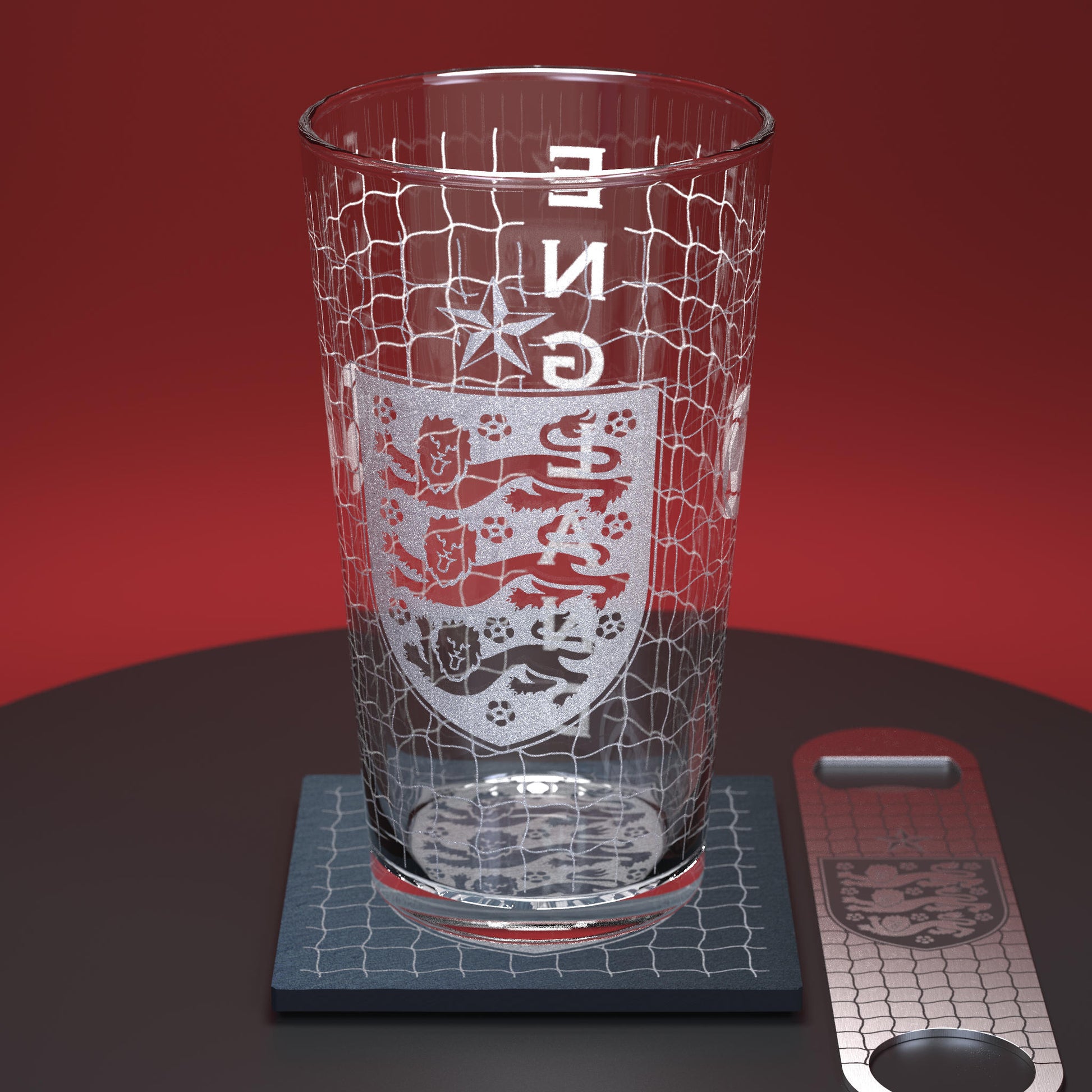 Pint glass set including a glass, slate coaster and stainless steel bottle opener, all engraved with the England football logo and net design