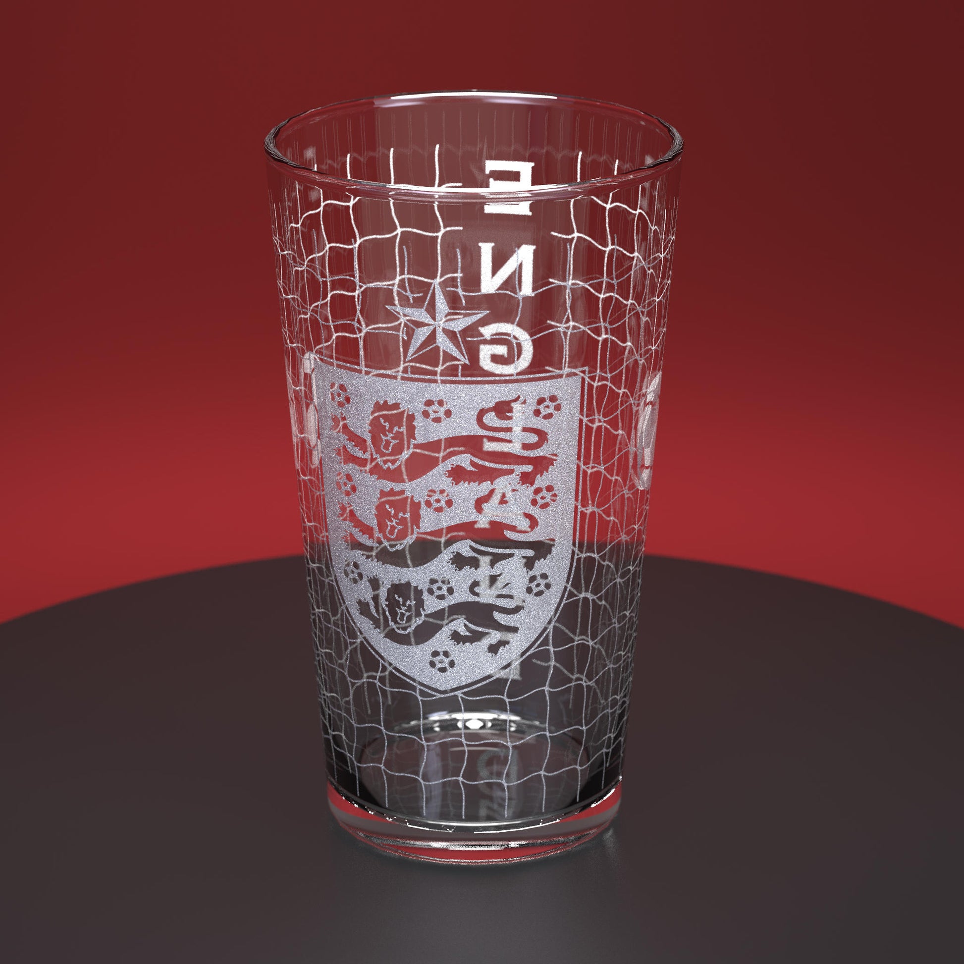 Pint glass engraved with England Football logo and net design