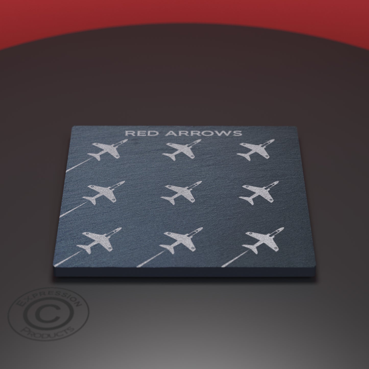 Slate coaster engraved with the red arrows in formation